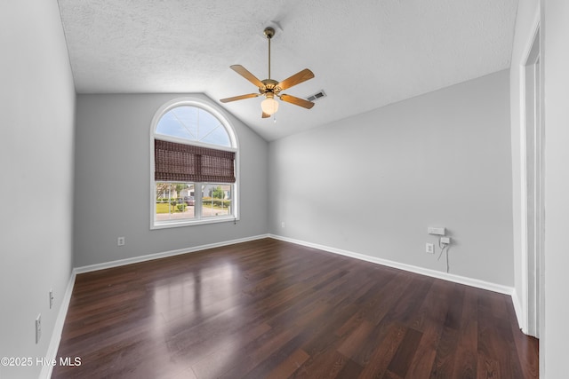 2418 Bradfield Ct, Wilmington, NC 28411 - spare room featuring lofted ceiling, a ceiling fan, wood finished floors, and a textured ceiling
