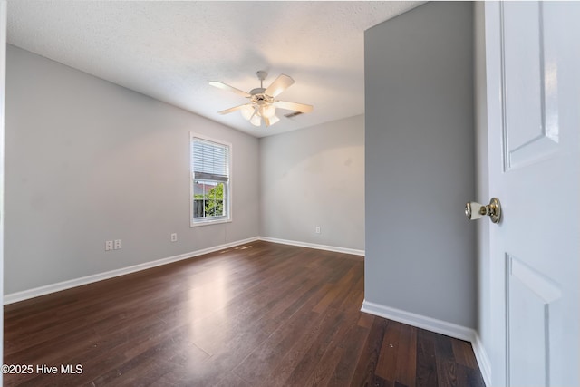 2418 Bradfield Ct, Wilmington, NC 28411 - unfurnished room featuring dark wood finished floors, ceiling fan, and a textured ceiling