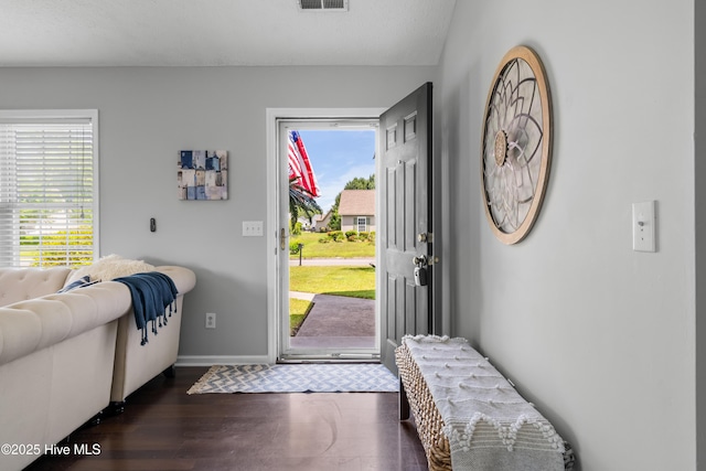 2418 Bradfield Ct, Wilmington, NC 28411 - entryway featuring dark wood finished floors and baseboards