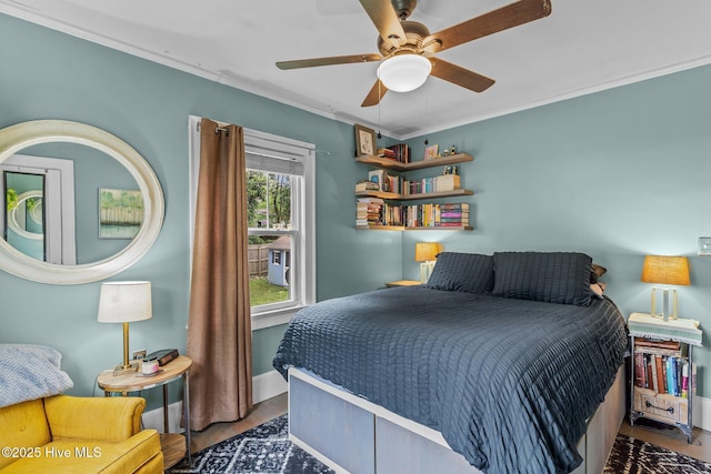 2018 Perry Ave, Wilmington, NC 28403 - bedroom featuring wood finished floors, ornamental molding, and a ceiling fan