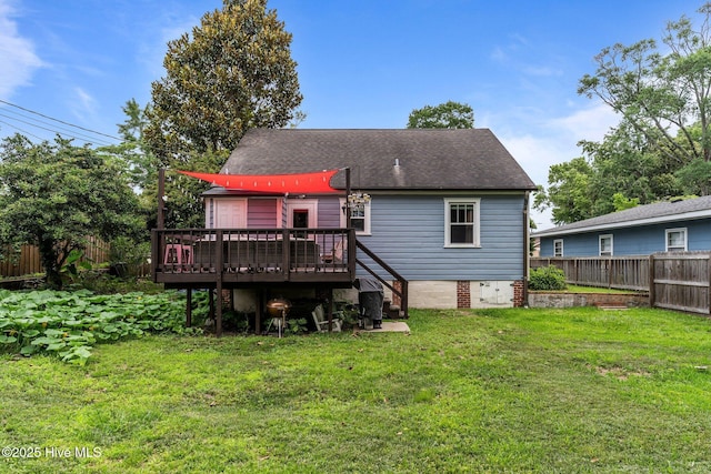 2018 Perry Ave, Wilmington, NC 28403 - rear view of property with a deck, a fenced backyard, and roof with shingles