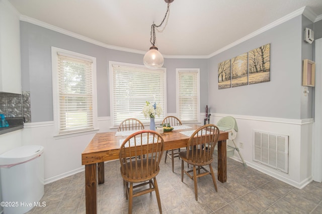 113 Lakehurst Dr, Dudley, NC 28333 - dining area featuring ornamental molding and wainscoting