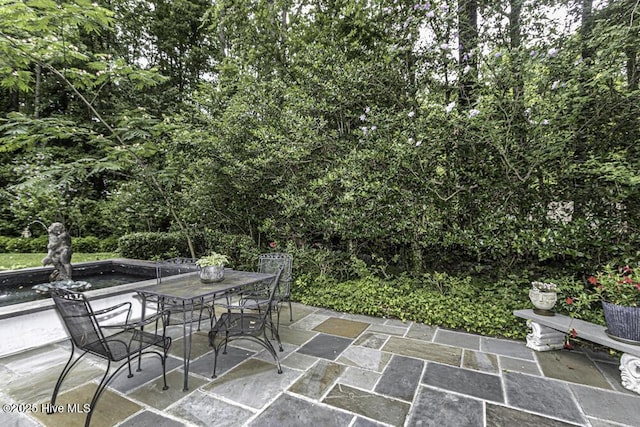 129 Steeplechase Rd, Rocky Mount, NC 27804 - view of patio featuring outdoor dining area