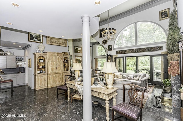 129 Steeplechase Rd, Rocky Mount, NC 27804 - living area with granite floors, ornate columns, a high ceiling, recessed lighting, and a chandelier