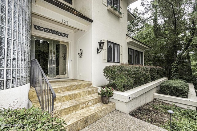 129 Steeplechase Rd, Rocky Mount, NC 27804 - view of exterior entry with stucco siding