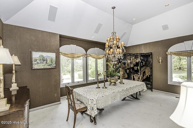 129 Steeplechase Rd, Rocky Mount, NC 27804 - dining space featuring a chandelier, light carpet, and vaulted ceiling