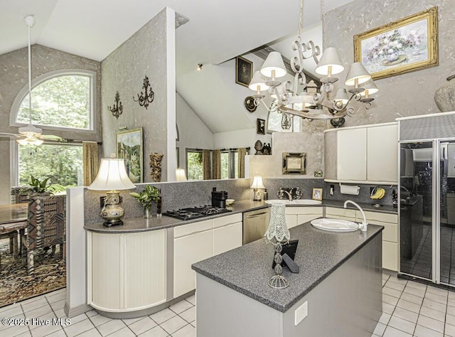 129 Steeplechase Rd, Rocky Mount, NC 27804 - kitchen featuring dishwasher, fridge, an island with sink, gas cooktop, and light tile patterned floors