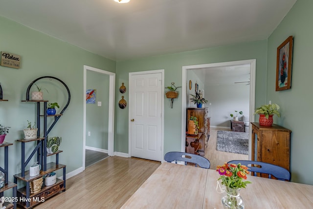 766 Swan Point Rd, Washington, NC 27889 - dining space featuring wood finished floors and baseboards
