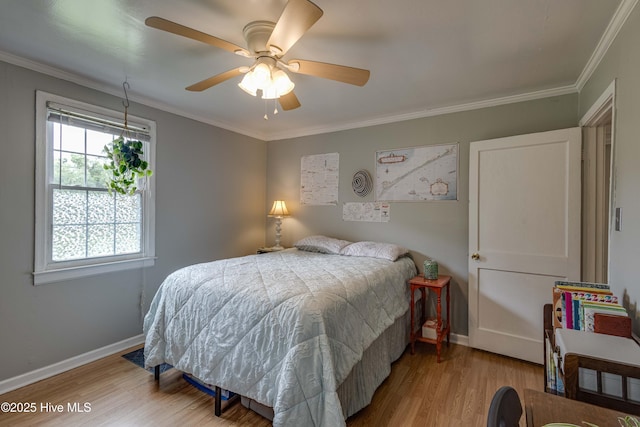 766 Swan Point Rd, Washington, NC 27889 - bedroom with wood finished floors, crown molding, and ceiling fan