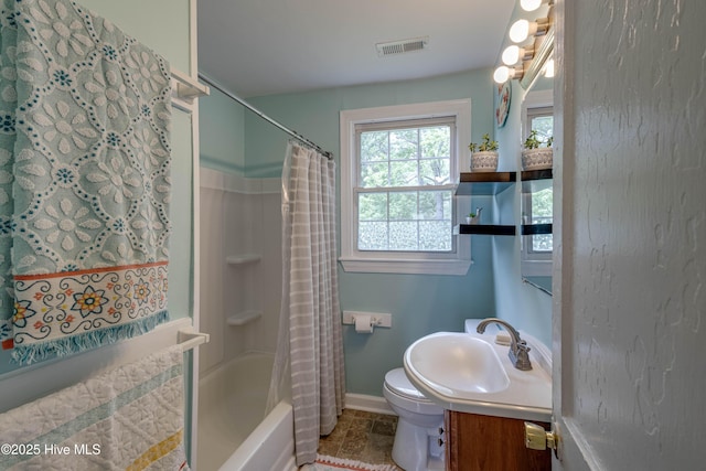 766 Swan Point Rd, Washington, NC 27889 - bathroom with vanity and shower / bath combo with shower curtain