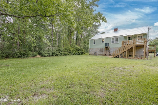 766 Swan Point Rd, Washington, NC 27889 - view of grassy yard with stairway and a deck