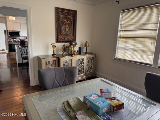 621 W Hayes St, Ahoskie, NC 27910 - dining space featuring wood finished floors and baseboards