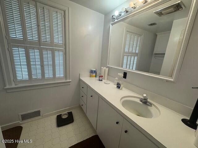 621 W Hayes St, Ahoskie, NC 27910 - bathroom with vanity and plenty of natural light
