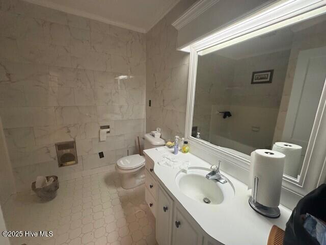 621 W Hayes St, Ahoskie, NC 27910 - bathroom featuring ornamental molding and vanity