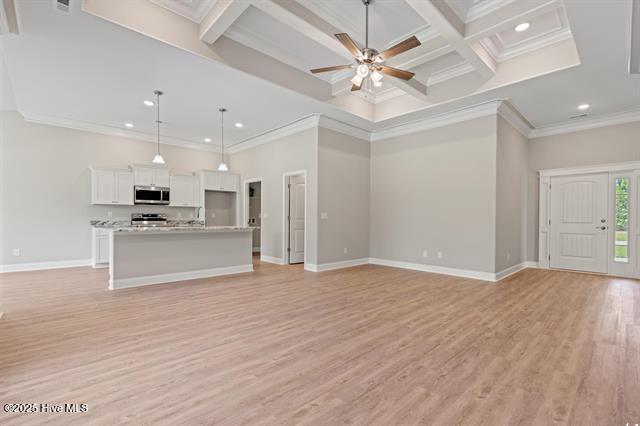 414 Laurel Ct NW, Calabash, NC 28467 - unfurnished living room with ornamental molding, recessed lighting, light wood-style flooring, coffered ceiling, and a ceiling fan