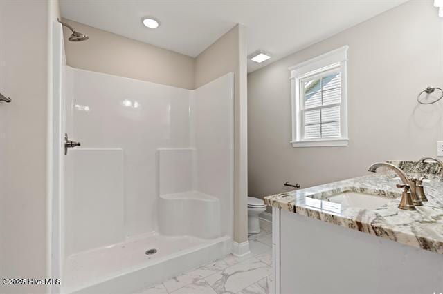 414 Laurel Ct NW, Calabash, NC 28467 - bathroom with vanity, marble look tile flooring, and a shower