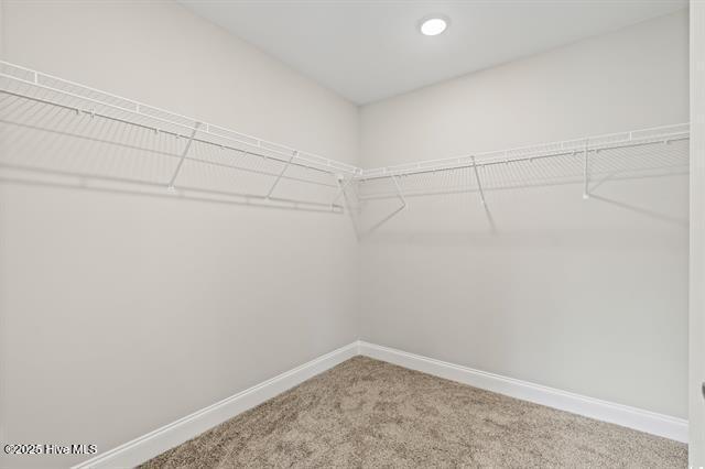 414 Laurel Ct NW, Calabash, NC 28467 - spacious closet featuring carpet floors