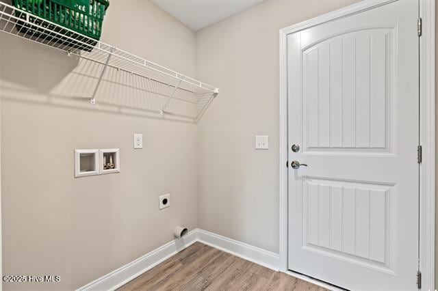 414 Laurel Ct NW, Calabash, NC 28467 - laundry room with hookup for an electric dryer, light wood-style flooring, and washer hookup