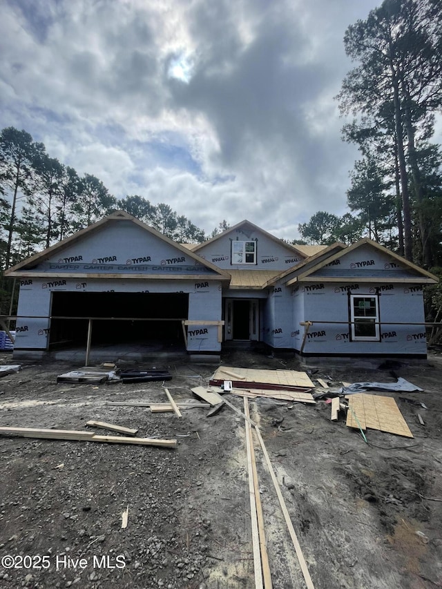 414 Laurel Ct NW, Calabash, NC 28467 - view of front facade featuring an attached garage