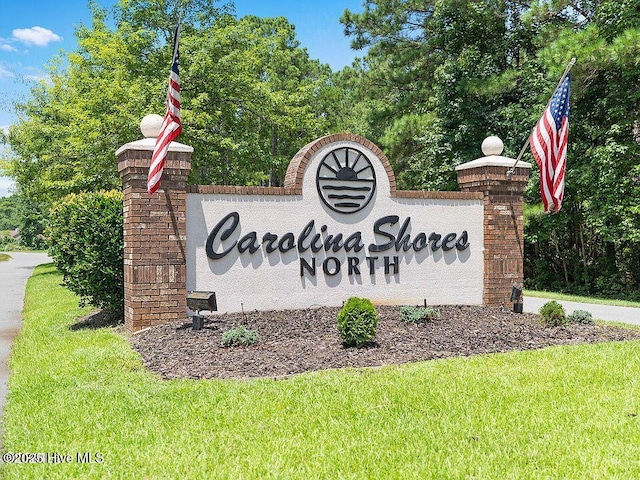 414 Laurel Ct NW, Calabash, NC 28467 - community / neighborhood sign with a lawn