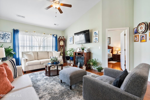 1067 Tideline Dr, Leland, NC 28451 - living area with a ceiling fan, wood finished floors, and high vaulted ceiling