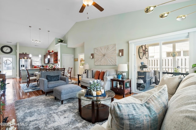 1067 Tideline Dr, Leland, NC 28451 - living area with wood finished floors, a ceiling fan, and high vaulted ceiling