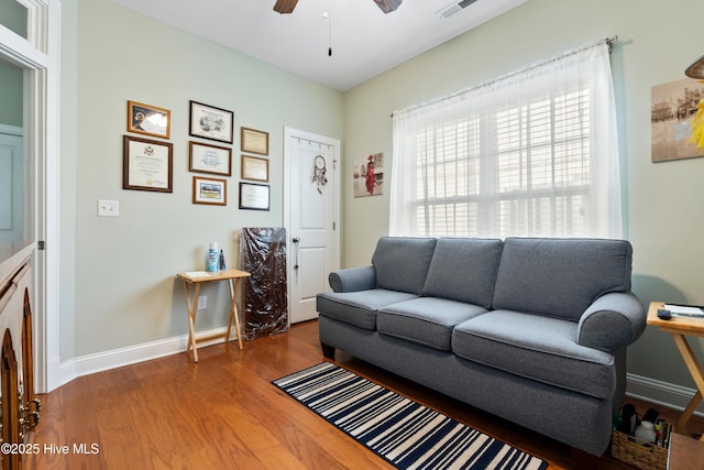 1067 Tideline Dr, Leland, NC 28451 - living area featuring a ceiling fan and wood finished floors