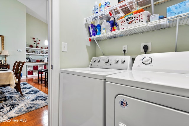 1067 Tideline Dr, Leland, NC 28451 - washroom featuring washer and clothes dryer and wood finished floors