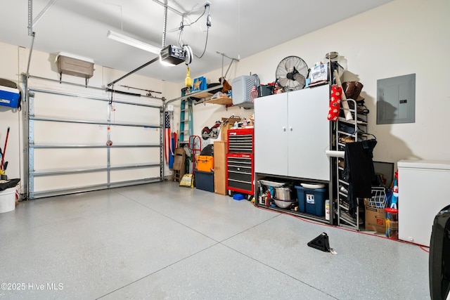 1067 Tideline Dr, Leland, NC 28451 - garage featuring electric panel and a garage door opener
