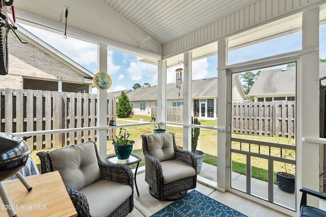 1067 Tideline Dr, Leland, NC 28451 - sunroom / solarium featuring vaulted ceiling and a residential view