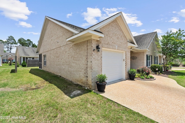 1067 Tideline Dr, Leland, NC 28451 - view of property exterior with a garage, brick siding, a yard, concrete driveway, and a shingled roof