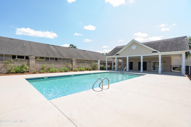 1067 Tideline Dr, Leland, NC 28451 - community pool featuring a patio area
