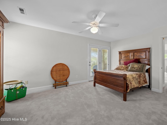 403 Emerald Landing Dr, Emerald Isle, NC 28594 - bedroom featuring access to exterior, light colored carpet, and a ceiling fan