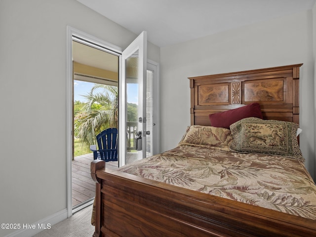 403 Emerald Landing Dr, Emerald Isle, NC 28594 - bedroom featuring access to exterior and carpet flooring