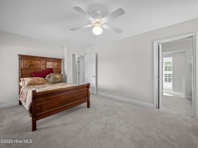 403 Emerald Landing Dr, Emerald Isle, NC 28594 - bedroom with light carpet and a ceiling fan