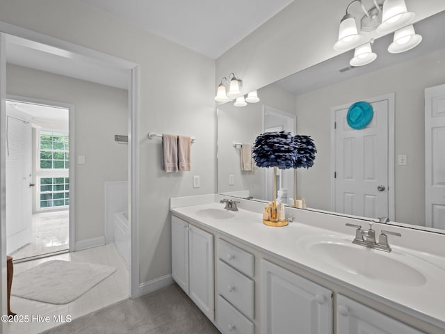 403 Emerald Landing Dr, Emerald Isle, NC 28594 - full bath with double vanity and a bath