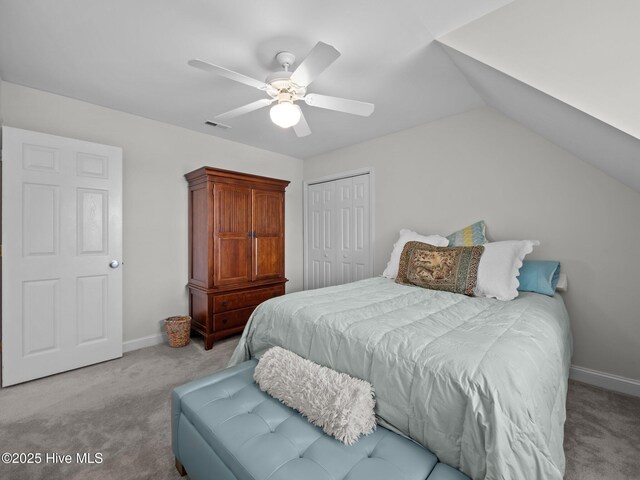 403 Emerald Landing Dr, Emerald Isle, NC 28594 - carpeted bedroom with a closet, ceiling fan, and vaulted ceiling
