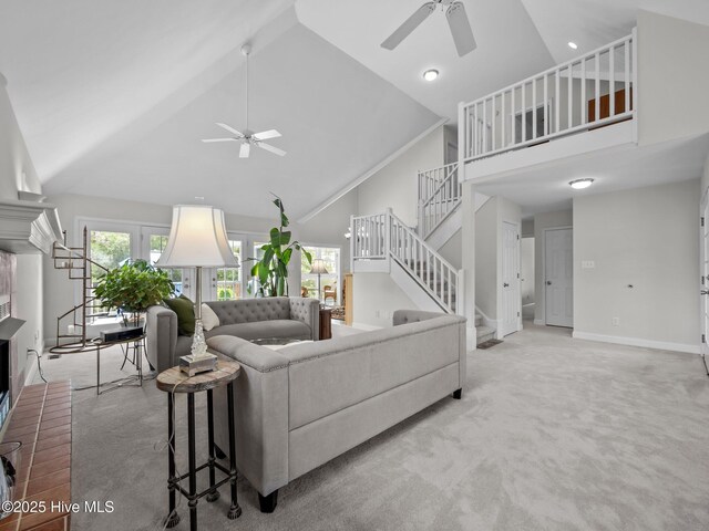403 Emerald Landing Dr, Emerald Isle, NC 28594 - carpeted living area with a ceiling fan, high vaulted ceiling, stairway, and recessed lighting