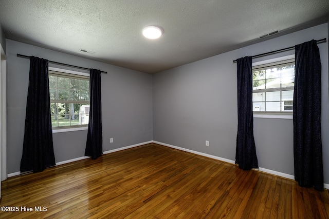 103 Elizabeth St, Havelock, NC 28532 - unfurnished room with wood finished floors and a textured ceiling