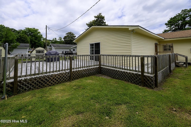 103 Elizabeth St, Havelock, NC 28532 - rear view of property with a wooden deck and a lawn