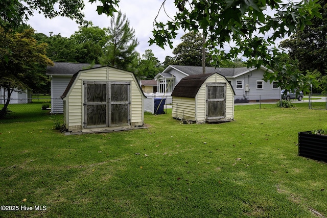 103 Elizabeth St, Havelock, NC 28532 - fenced backyard with a storage unit