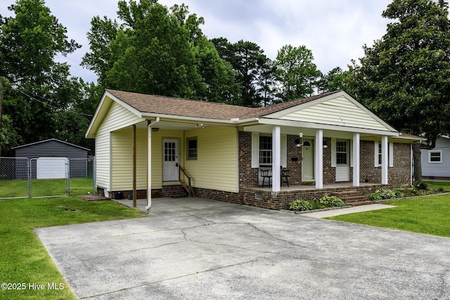 103 Elizabeth St, Havelock, NC 28532 - view of front of house featuring driveway, covered porch, a garage, entry steps, and roof with shingles