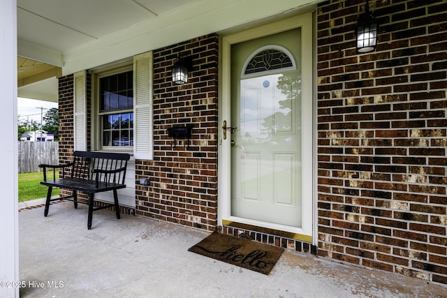 103 Elizabeth St, Havelock, NC 28532 - property entrance featuring a porch and brick siding