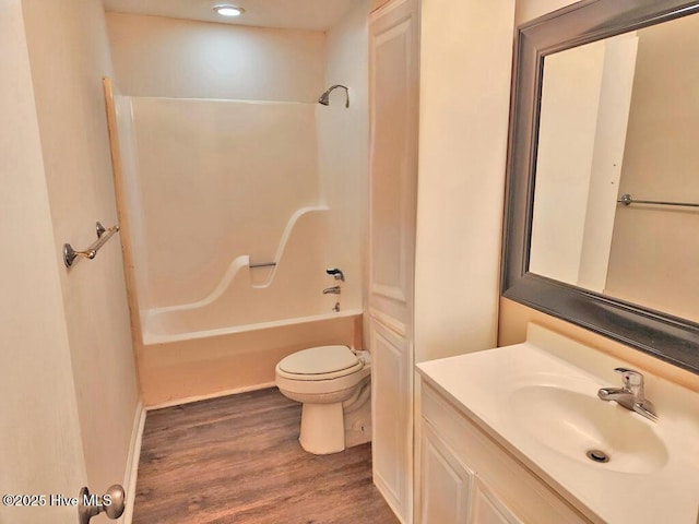 2823 Harvest, Grimesland, NC 27837 - full bath featuring vanity, wood finished floors, and  shower combination