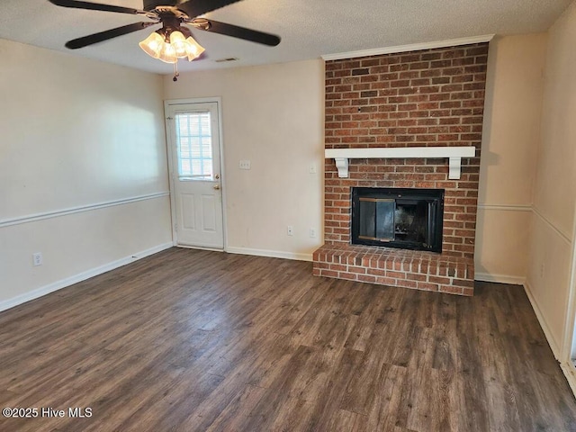 2823 Harvest, Grimesland, NC 27837 - unfurnished living room featuring wood finished floors, ceiling fan, a textured ceiling, and a brick fireplace