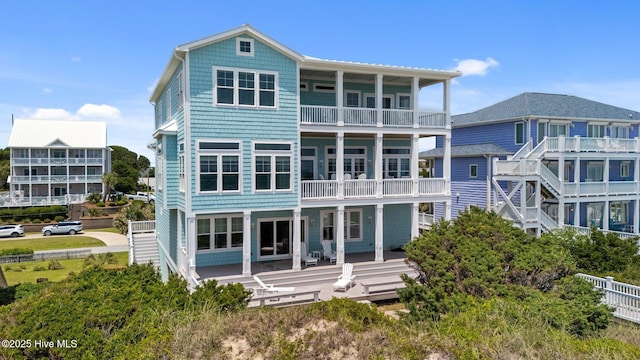 4101 Ocean Dr, Emerald Isle, NC 28594 - rear view of property with a balcony