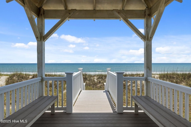 4101 Ocean Dr, Emerald Isle, NC 28594 - wooden deck featuring view of water and beach