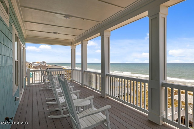 4101 Ocean Dr, Emerald Isle, NC 28594 - wooden deck featuring view of water and beach