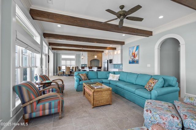 4101 Ocean Dr, Emerald Isle, NC 28594 - living room featuring beam ceiling, a ceiling fan, ornamental molding, arched walkways, and recessed lighting