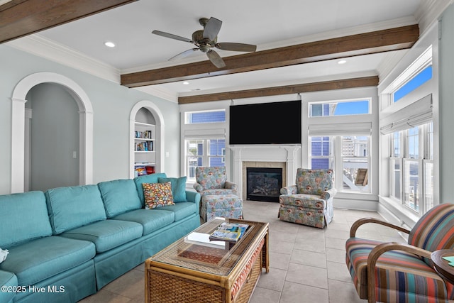 4101 Ocean Dr, Emerald Isle, NC 28594 - living room featuring ornamental molding, beam ceiling, a glass covered fireplace, ceiling fan, and recessed lighting